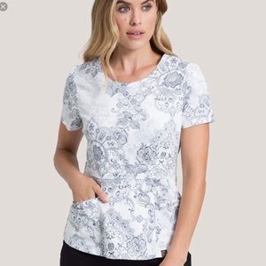 Jaanuu Peplum Scrub Top